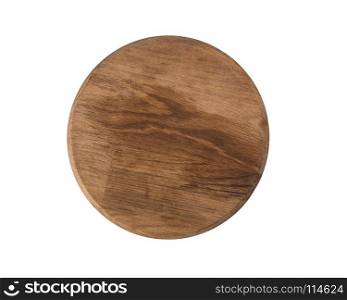 Empty wooden round old kitchen board, top view