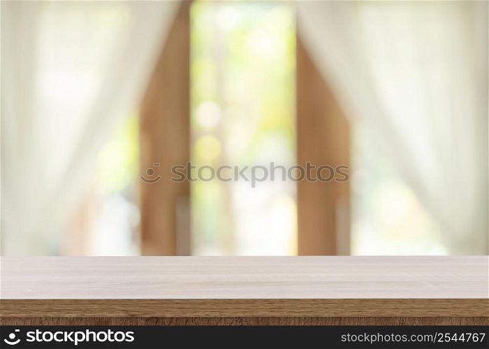 Empty wooden table and blur window background with copy space, display montage for product.
