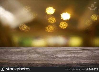 Empty wooden table in front of abstract blurred background of bokeh light . can be used for display or montage your products.Mock up for display of product.