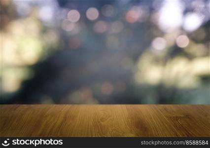 Empty wooden table in front of abstract blurred green of garden and house background. For montage product display or design key visual layout - Image