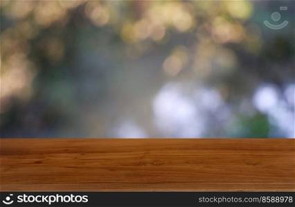 Empty wooden table in front of abstract blurred green of garden and trees  background. For montage product display or design key visual layout - Image 