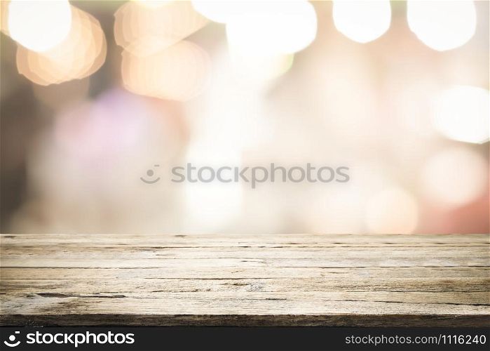 Empty wooden table platform and bokeh at night