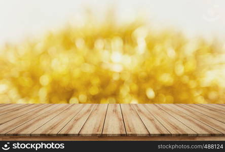 Empty wooden tabletop visual design layout for sale promotion products display with blurred gold ribbon background