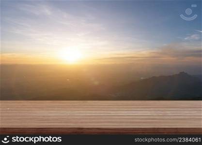 empty wooden tabletop with mountain in morning time. countryside landscape.