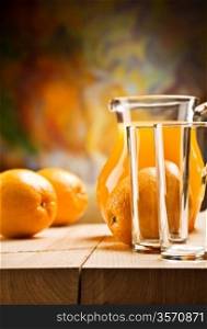 emrty glassware and oranges