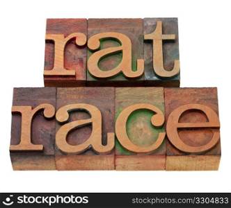 endless, self-defeating or pointless pursuit - rat race phrase in vintage wooden letterpress printing blocks, stained by color inks, isolated on white