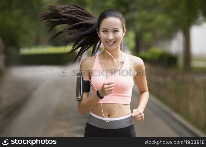 Energetic beauty running for fitness