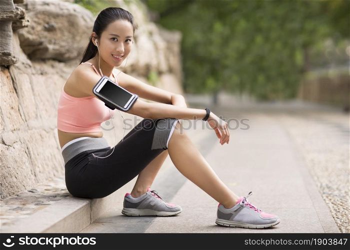 Energetic beauty taking a rest after working out