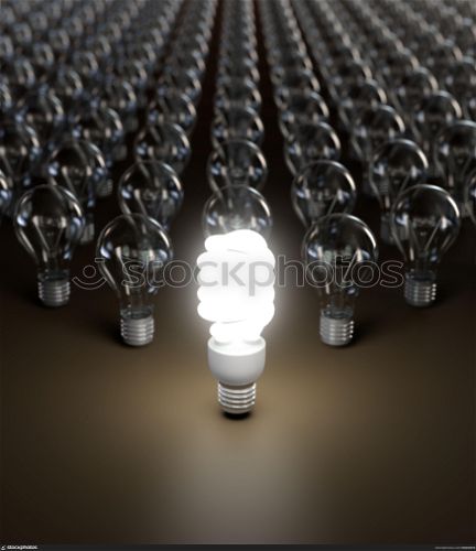 Energy saving and simple light bulbs isolated on brown background.