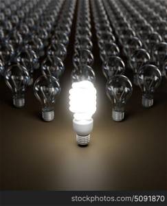 Energy saving and simple light bulbs isolated on brown background.