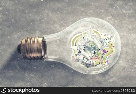 Energy saving concept. Planet Earth inside of light bulb. Elements of this image are furnished by NASA