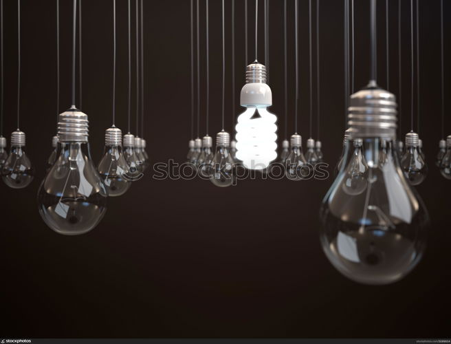 Energy saving light bulb among simple light bulbs.