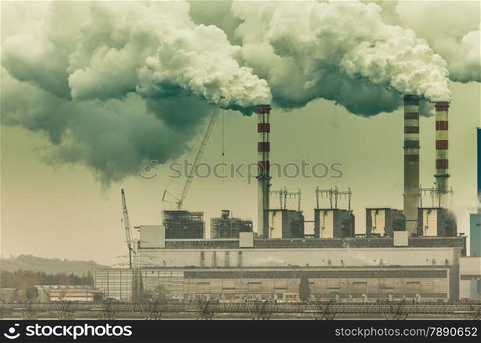 Energy. Smoke from chimney of power plant or station. Industrial landscape. Autumnal foggy day