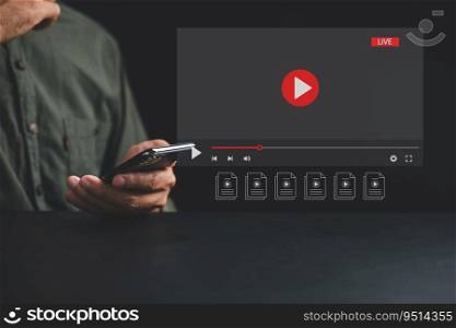 Engage with world of video streaming on smartphone, man touches screen to initiate live streaming. Embrace the convergence of technology and entertainment in the realm of social media and multimedia.