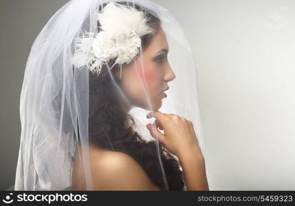 Engagement. Loveliness. Side view of Sincere Affectionate Woman in Veil