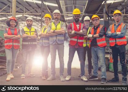 Engieer team group of factory industry worker people standing confident mix race