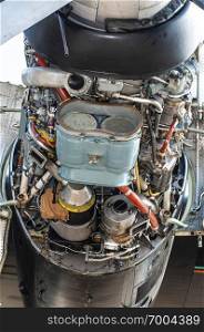 Engine and propeller of a military plane. Disassemble and repair engine of plane. Engine design of a military aircraft. 