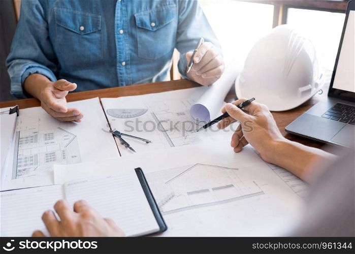 Engineer architect design team colleagues working office discussing meeting discussion construction project concept