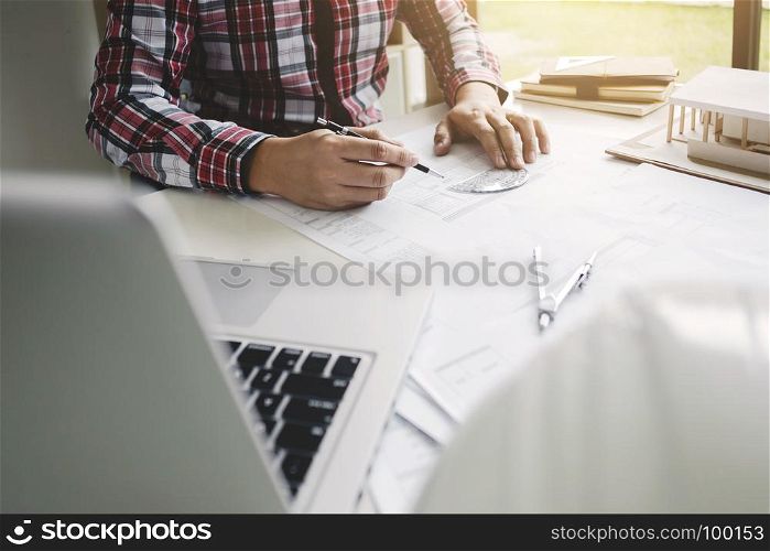 engineer architect working on blueprint with tools - interior architect concept