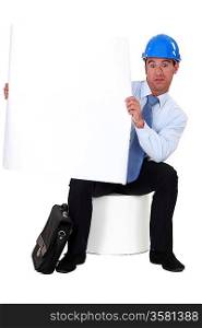 Engineer holding a blank sign