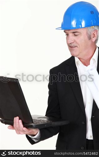 Engineer holding his laptop