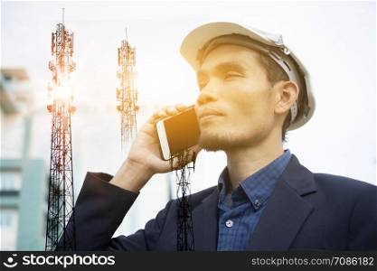 Engineer holding mobile smart phone And Using to call by internet technology