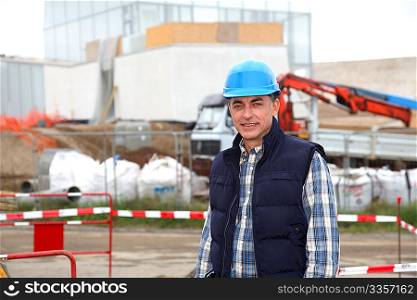 Engineer on construction site with security helmet