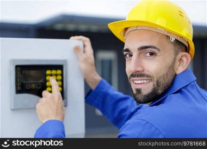 engineer operating a machine outdoors