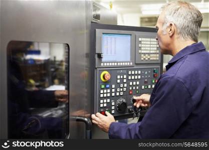 Engineer Operating Computer Controlled Lathe