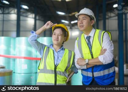 Engineer people are wearing protective mask working in warehouse