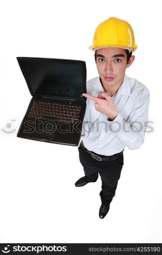 Engineer pointing to a laptop