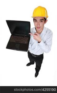 Engineer pointing to a laptop