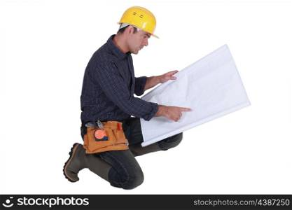 Engineer reading plans