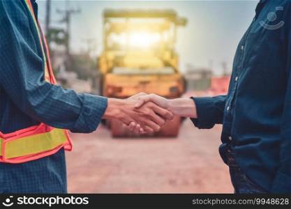 Engineer teamwork shake hand on site construction