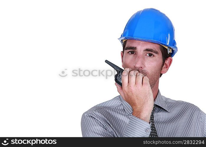 Engineer using a walkie-talkie