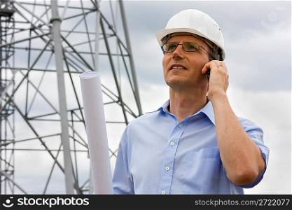 Engineer with mobile phone