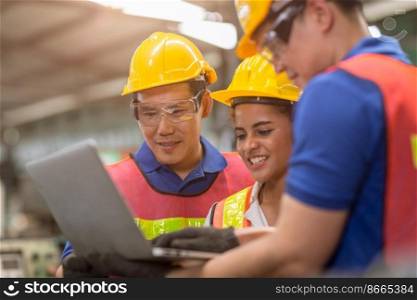 engineer women working with male team mix race work help together in heavy industry with laptop computer discussion, join partner good teamwork.