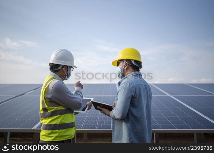 engineering and technician solar panel renewable energy power station in Thailand.