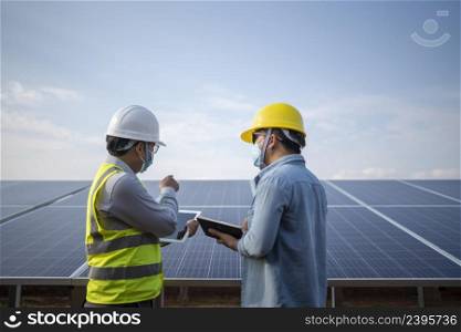 engineering and technician solar panel renewable energy power station in Thailand.