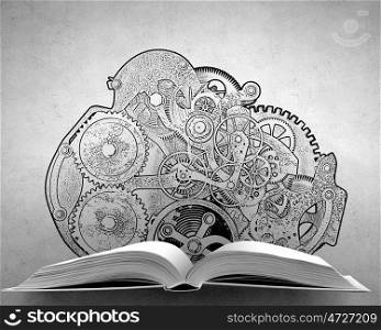 Engineering education and literature. Opened book with gears and cogwheel mechanism on pages