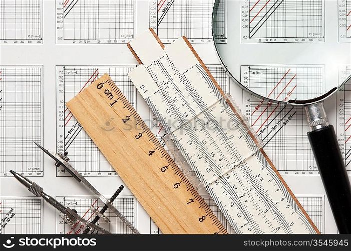 engineering tools on a technical drawing