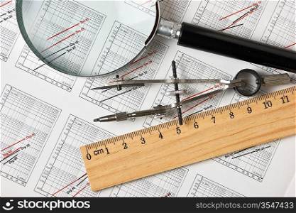 engineering tools on a technical drawing