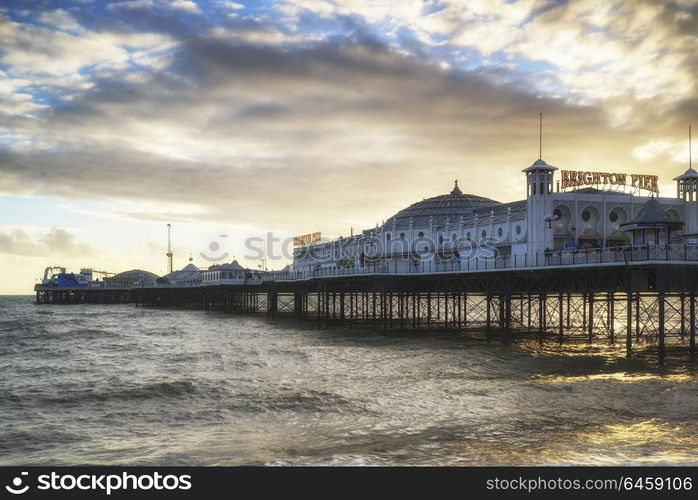 England, East Sussex, Brighton. Winter sunset over Brighton Pier on the south coast.. Winter sunset landscape of Brighton Pier on the south coast of England