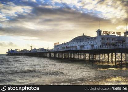 England, East Sussex, Brighton. Winter sunset over Brighton Pier on the south coast.. Winter sunset landscape of Brighton Pier on the south coast of England