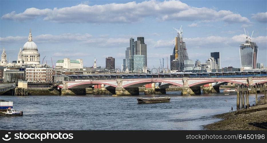 England, London, Southbank. Panorama of the London skyline.. Beautiful large panorama of London City skyline on lovely blue sky Summer day