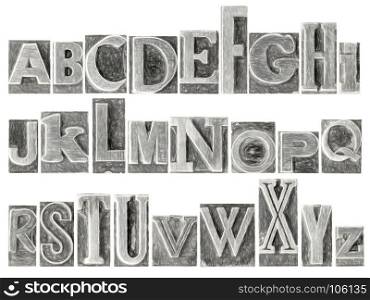 English alphabet set - a collage of 26 isolated letters in letterpress metal type printing blocks, a variety of mixed fonts with a digital charcoal painting effect