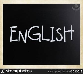 ""English" handwritten with white chalk on a blackboard."