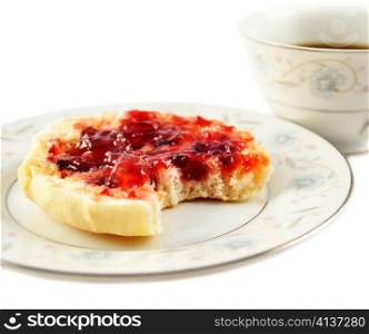 english muffins with jelly and coffee on white background