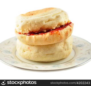 english muffins with jelly on white background