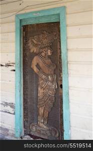 Engravement on a door, Cayman Cay, Utila Island, Bay Islands, Honduras